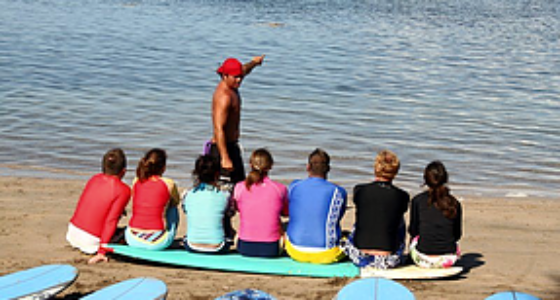 Get surfing lessons on Maui